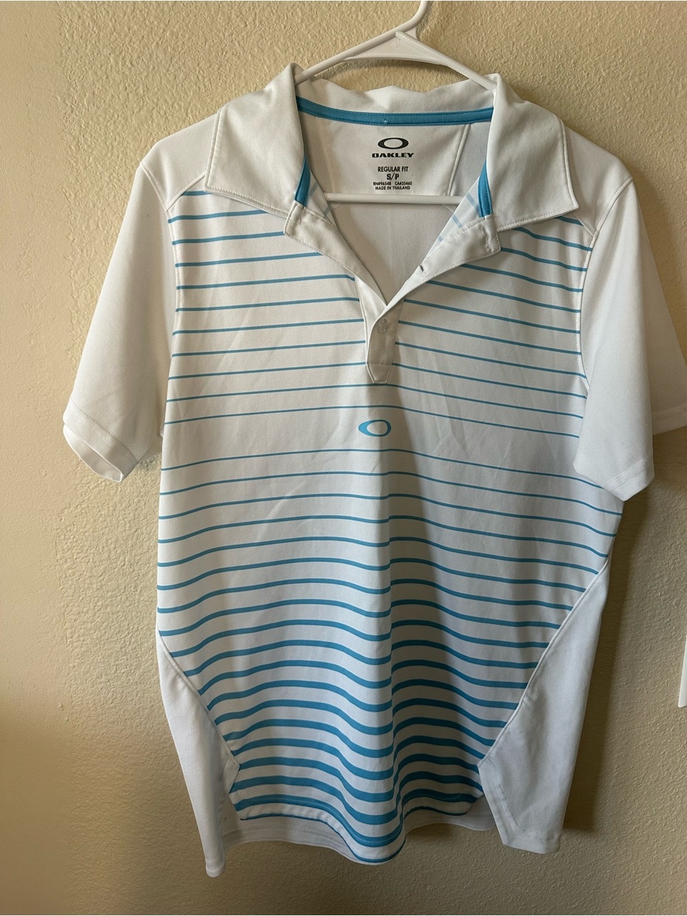 Oakley White Polo with Light Blue Horizontal Stripes size S/ NWOT 1443